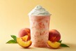 © si9nzation - Refreshing peach smoothie with whipped cream served in a plastic cup alongside fresh peaches on a yellow backdrop evokes summer vibes