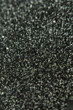 © Lana Pietukhova - close-up of a sparkling silver glitter texture, abstract festive background with shimmering tiny particles and shallow depth of field, concept of holidays, new year,xmas, celebrations, christmas.
