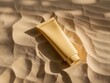 © HiArbaiyah - Luxurious sun protection cream tube resting on soft sand dunes bathed in warm golden sunlight, evoking summer escapism and skincare.