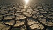 © Solaz - Cracked dry earth surface under bright sunlight with deep fissures