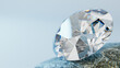© AddMeshCube - brilliant luxury diamond resting on a rough stone, macro close-up with copy space on a light background. 3d rendering