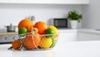 © Nebula - A wire basket filled with citrus fruits—lemons, limes, oranges, and a tangerine—rests on a white kitchen counter in a modern space with white cabinetry and a green potted plant, evoking freshness, cla