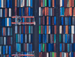 © AmazingAerialAgency - Aerial view of stacked shipping containers create a colorful mosaic of global commerce at the Port of Los Angeles, California, United States.