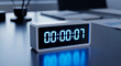 © Deva Braga - Modern digital timer counting up in sleek office setting, perfect for project management or time tracking visualizations and promoting focus and efficiency