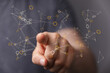 © vegefox.com - A hand pointing towards a network of connections, representing concepts like data, technology, communication, and the digital world. Perfect for