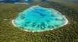 © Rizki - Aerial view captures vibrant turquoise lagoon nestled within dense tropical foliage surrounding islands