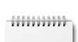 © Zahidul Creative - Close up of a spiral bound notebook with blank pages isolated on white background