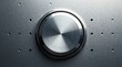 © napak - Close-up of a polished metallic rotary control on a textured surface with subtle lighting