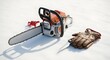 © Wool World - A powerful orange chainsaw adorned with a festive red bow sits alongside a sturdy leather glove and a sharp knife on fresh snow