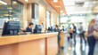 © jechm - Bank customers waiting in line at teller counter, blurred background