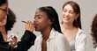 © peopleimages.com - Backstage, getting ready and makeup with women in studio for fashion showcase preparation. Behind the scenes, beauty or cosmetics with cosmetologist and talent on white background for styling