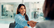 © peopleimages.com - Woman, handshake and smile with hiring, welcome and recruitment process for deal at company. Person, human resources and shaking hands with thanks, agreement or onboarding with interview at agency