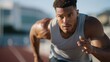© Tania - A sprinter practicing explosive starts on a track, symbolizing speed, strength, and precision in professional athletic preparation. cinematic color correction, natural uneven lighting yet gentle