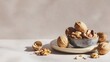 © Line - Assorted walnuts and nuts in bowl on neutral background