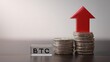 © Line - Bitcoin value growth concept with red arrow and coin stacks