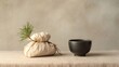 © Line - Eco gift pouch and black ceramic teacup with pine branch