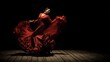 © RaneshaSky - A dancer in red dress twirls, dramatic pose on a wooden stage with darkness