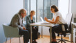© Monkey Business - Senior Couple Meeting With Female Financial Advisor In Office