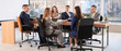 © Pixel-Shot - Business women shaking hands at table in conference room