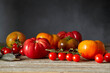 © The Picture Pantry - Heirloom and Cherry tomatoes arranged on a wooden surface