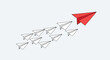 © AHMAD.FAJAR - Strategic direction illustrated by a red paper plane leading a fleet of white planes conveying