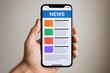 © The Little Hut - Hand Holding Smartphone Displaying News App Interface with Modern Design and Clean User Experience