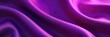 © Sathaporn Buarabut - Luxurious silk fabric in rich, deep purple, subtly shimmering under soft light Close-up texture shot highlighting the lustrous sheen and delicate drape of the material , sheen, drapery
