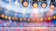 © venusvi - Stage lights illuminate a vibrant venue, creating a captivating atmosphere for performances and events.