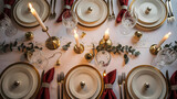 Elegant holiday table setting with candlelight fine china and festive decor