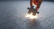 © Rohan - Hand placing the final glowing jigsaw puzzle piece into a pattern, representing the successful completion of a strategy or problem solving concept