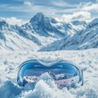 © Koja - These sleek ski goggles resting on pristine snow expertly reflect a breathtaking mountain landscape, emphasizing the essence of winter sports and adventure in a snow-covered wonderland.