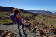 © Xalanx - Woman hiker with camera on an uphill trail towards Pico Viejo
