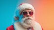 © Oleksandr - Cool Santa with Sunglasses: A portrait of Father Christmas donning shades, set against a vibrant blue and orange backdrop. Festive spirit meets modern style!
