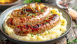© Bill - Grilled pork sausages served with mashed potatoes and caramelized onions. AI