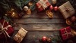 © Aleeza - Festive christmas presents and ornaments arranged on a rustic wooden table with evergreen branches and warm lights