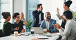 © peopleimages.com - Happy, business people or meeting with high five, celebration or laptop for corporate success. Excited group, employees or colleagues with documents, computer or proposal for winning or teamwork