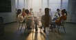 © Framestock - Diverse Group of Students Participates in Classroom Talk on Mental Health Guided by Compassionate Teacher. Concept Empathy, Open Communication, and Psychological Safety in Education. Slow Motion.
