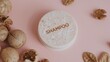 © The 2R Artificiality - Round dry handmade shampoo bar labeled 'shampoo' with foam, crafted from cold pressed oil and walnuts, promoting a zero waste lifestyle
