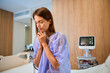 © Svitlana - Young female patient praying while receiving oxygen therapy in hospital
