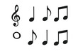© Andrei - Collection of basic musical notation symbols including treble clef and various note values in black silhouette