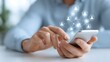 © pkproject - Modern hands engage with a mobile phone screen illustrating a digital network connecting user icons and representing global connectivity social interaction and technological communication