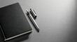 © Aurora Aesthetics - An elegant fountain pen resting on a closed black leather journal on a desk with copy space for text planning concept