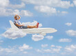 © Ljupco Smokovski - Male tourist sitting on top of an airplane and flying