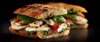 © Sarinya - Close up captures a delicious chicken sandwich with pesto mozzarella spinach and roasted red pepper on ciabatta bread