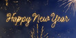 © Arma - Happy New Year text written in sparkling gold firework script against a dark blue night sky with burst fireworks and glowing particles in the background