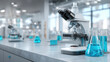 © Kmikhidov - Bright laboratory interior with microscopes, blue test liquids and sterile white surfaces arranged neatly for precise experiments, modern scientific environment concept