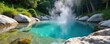 © Phetthanousack - Steam rises from a crystal-clear natural hot spring pool, surrounded by lush green vegetation and smooth, grey rocks The tranquil scene evokes serenity and natural beauty , mist, water