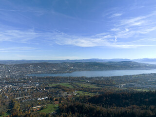  Aerial view of beautiful Swiss autumn landscape with city of Zürich seen from local mountain Uetliberg on a sunny autumn day. Photo taken October 29th, 2025, Zurich Uetliberg, Switzerland.