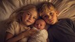 © DnQajik - Three children peacefully sleeping side by side in a cozy bed, their faces illuminated by soft, warm light