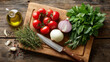 © Nattapol - Fresh vegetable and herb for cooking healthy meal. Food ingredient like tomato, onion, and garlic arranged on rustic wooden cutting board